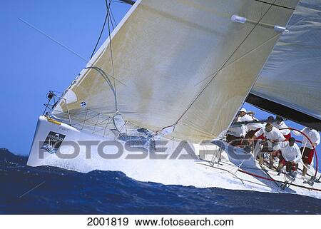 Hawaii, Kenwood Cup, View Of Yacht's Bow From Ocean, Large Sail View Large Photo Image Stock Photo - Hawaii, Kenwood Cup, View Of Yacht's Bow From Ocean, Large Sail. Fotosearch