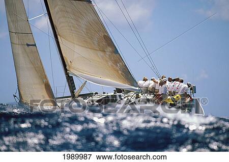 Hawaii, Kenwood Cup, Wave In Foreground Of Crew Sitting On Yacht Starboard Side View Large Photo Image Stock Photo - Hawaii, Kenwood Cup, Wave In Foreground Of Crew Sitting On Yacht Starboard Side. Fotosearch