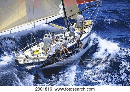 Stock Photograph - Hawaii, Kenwood Cup Yacht Race, Aerial View Of 'windquest' And Crew. Fotosearch