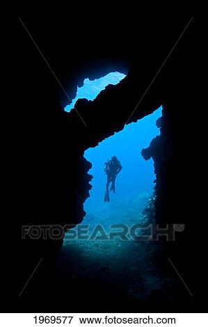 Stock Photo - Hawaii, Lanai, Diver Pictured At The Entrance To First Cathedral Off The Island.. Fotosearch