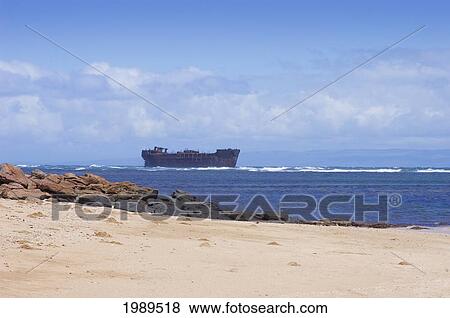 Stock Photo - Hawaii, Lanai, Kaiolohia Beach, World War Ii Liberty Ship On The Reef Off Shipwreck Beach.. Fotosearch