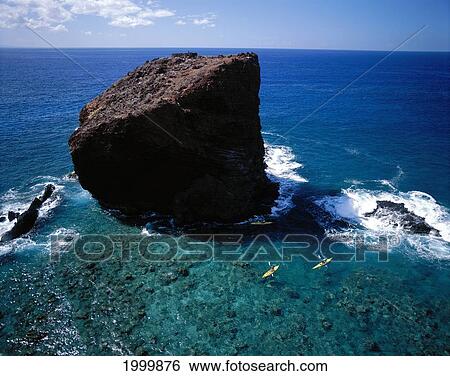 Hawaii, Lanai, Pu'u Pehe Rock View From Above People Kayaking In Ocean South Shore D1231 View Large Photo Image Stock Photograph - Hawaii, Lanai, Pu'u Pehe Rock View From Above People Kayaking In Ocean South Shore D1231. Fotosearch