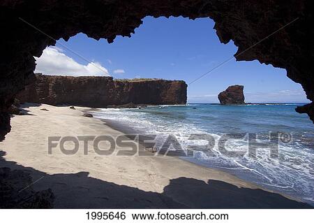 Stock Photograph - Hawaii, Lanai, Pu'u Pehe, Sweetheart Rock Seen From Sea Cave. Fotosearch