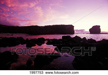 Stock Image - Hawaii, Lanai, Sunrise At Pu'u Pehe, Sweetheart Rock. Fotosearch