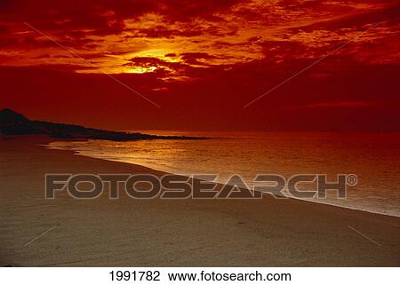 Stock Image - Hawaii, Lanai, Tropical Sunset At Polihua Beach.. Fotosearch
