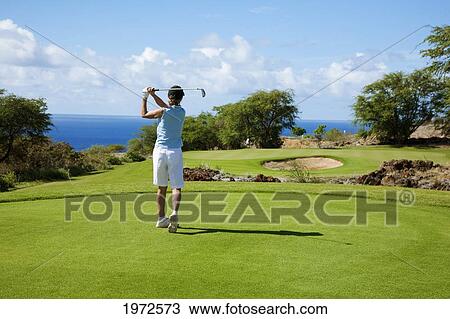 Hawaii, Lanai, Woman Hitting A Tee Shot On The Challenge At Manele Golf Course. View Large Photo Image Stock Image - Hawaii, Lanai, Woman Hitting A Tee Shot On The Challenge At Manele Golf Course.. Fotosearch