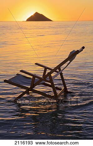 Hawaii, Lanikai, Empty beach chair at sunset. View Large Photo Image Stock Image - Hawaii, Lanikai, Empty beach chair at sunset.. Fotosearch