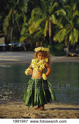 Stock Photo - Hawaii, Little Hula Girl On Beach, With Ti Leaf Skirt, Plumeria Lei.. Fotosearch