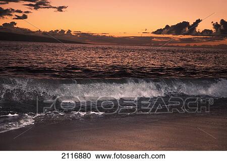 Hawaii, Maui, A sunset looking across the channel to the island of Lanai. View Large Photo Image Stock Image - Hawaii, Maui, A sunset looking across the channel to the island of Lanai.. Fotosearch