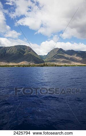 Picture - Hawaii, Maui, A view of the west Maui Mountains with ocean on a sunny day.. Fotosearch