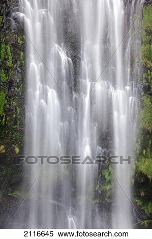 Hawaii, Maui, A waterfall in Kipahulu with lush foliage. View Large Photo Image Stock Photography - Hawaii, Maui, A waterfall in Kipahulu with lush foliage.. Fotosearch