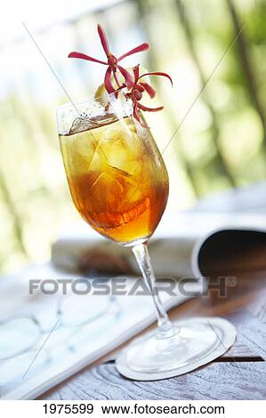 Stock Photo - Hawaii, Maui, Balcony Ice Tea Refreshment.. Fotosearch