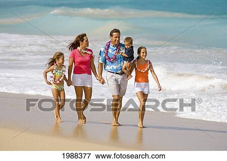 Stock Photo - Hawaii, Maui, Baldwin Beach, Family On Vacation Walking Down The Beach.. Fotosearch