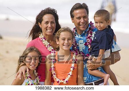 Stock Image - Hawaii, Maui, Baldwin Beach, Portrait Of A Family On Vacation. Fotosearch