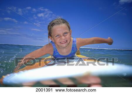 Hawaii, Maui, Close-Up Front View Blonde Girl On Surfboard Smiles Into Camera D1035 View Large Photo Image Stock Image - Hawaii, Maui, Close-Up Front View Blonde Girl On Surfboard Smiles Into Camera D1035. Fotosearch