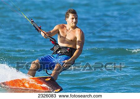 Stock Image - Hawaii, Maui, Close Up Of Professional Kiteboarder Niccolo Porcella. Editorial Use Only.. Fotosearch
