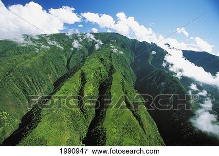 Hawaii, Maui, Crevices Descending From Pu'u Kukui, Clouds In Sky View Large Photo Image Stock Photo - Hawaii, Maui, Crevices Descending From Pu'u Kukui, Clouds In Sky. Fotosearch