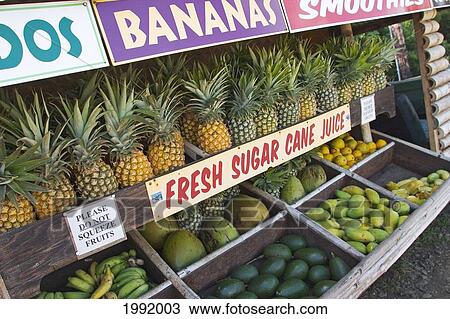 Stock Image - Hawaii, Maui, Fruit Stand On Hana Highway At The Entrance To Twin Falls Trail.. Fotosearch