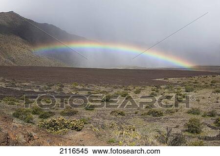 Stock Photography - Hawaii, Maui, Haleakala, Crater, A bright, colorful rainbow.. Fotosearch