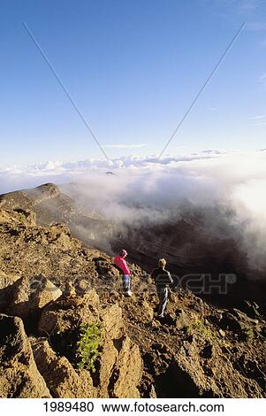 Hawaii, Maui, Haleakala Crater, Couple Enjoys The View. View Large Photo Image Stock Image - Hawaii, Maui, Haleakala Crater, Couple Enjoys The View.. Fotosearch