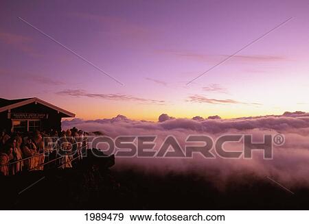 Hawaii, Maui, Haleakala Crater, People Stand And Watch The Sunrise. View Large Photo Image Stock Photo - Hawaii, Maui, Haleakala Crater, People Stand And Watch The Sunrise.. Fotosearch