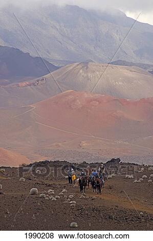 Hawaii, Maui, Haleakala Crater, Horseback Riders Climbing Sliding Sands Trail View Large Photo Image Stock Photo - Hawaii, Maui, Haleakala Crater, Horseback Riders Climbing Sliding Sands Trail. Fotosearch