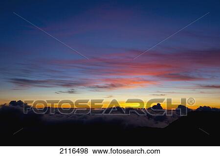 Hawaii, Maui, Haleakala sunrise. View Large Photo Image Stock Photo - Hawaii, Maui, Haleakala sunrise.. Fotosearch