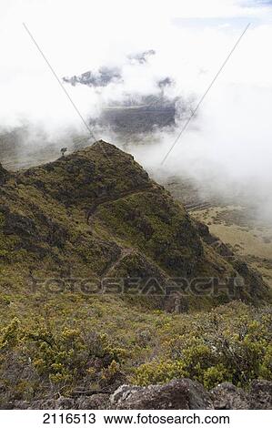 Hawaii, Maui, Haleakala Switchbacks through clouds View Large Photo Image Stock Image - Hawaii, Maui, Haleakala Switchbacks through clouds. Fotosearch