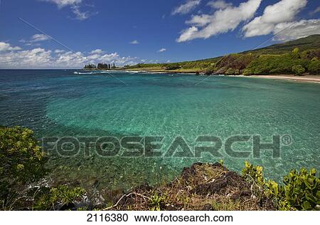 Hawaii, Maui, Hana, A sunny view of Hamoa Beach with clear ocean on a calm day. View Large Photo Image Stock Image - Hawaii, Maui, Hana, A sunny view of Hamoa Beach with clear ocean on a calm day.. Fotosearch