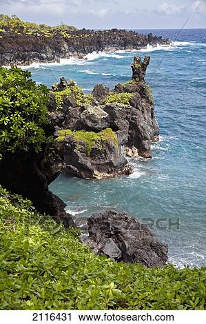 Stock Image - Hawaii, Maui, Hana, A view of the Waianapanapa Coast.. Fotosearch