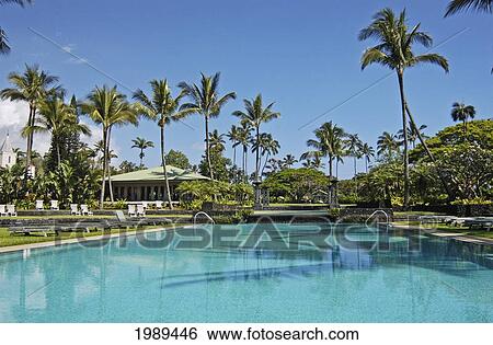 Stock Photograph - Hawaii, Maui, Hana Coast, Swimming Pool And Wellness Center At The Sea Ranch Cottages At Hotel Hana.. Fotosearch