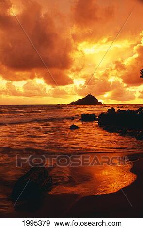 Hawaii, Maui, Hana, Gorgeous Orange And Yellow Sunrise Over The Ocean View Large Photo Image Stock Photo - Hawaii, Maui, Hana, Gorgeous Orange And Yellow Sunrise Over The Ocean. Fotosearch