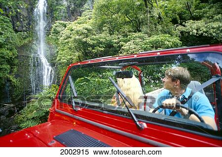 Hawaii, Maui, Hana, Kipahulu, Couple In Red Jeep, Close-Up, View Wailua Falls View Large Photo Image Stock Photography - Hawaii, Maui, Hana, Kipahulu, Couple In Red Jeep, Close-Up, View Wailua Falls. Fotosearch