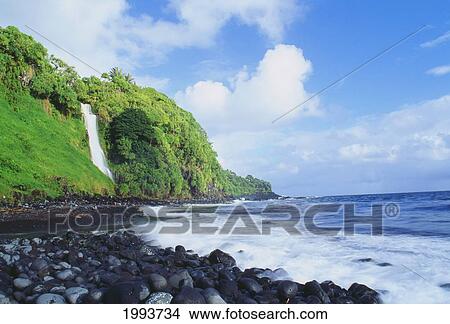 Picture - Hawaii, Maui, Hana, Pokupupu Point And Waikani Falls Going Into Ocean. Fotosearch