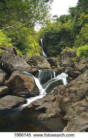 Hawaii, Maui, Hana, Remote Waterfall Along Rocky Stream. View Large Photo Image Stock Photography - Hawaii, Maui, Hana, Remote Waterfall Along Rocky Stream.. Fotosearch