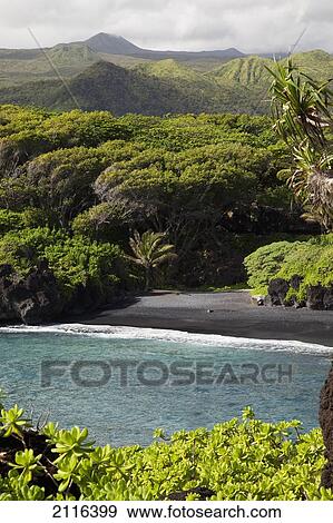 Stock Photo - Hawaii, Maui, Hana, The Black Sand Beach of Waianapanapa.. Fotosearch