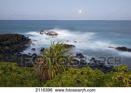 Stock Photograph - Hawaii, Maui, Hana, The moon rising over soft ocean.. Fotosearch