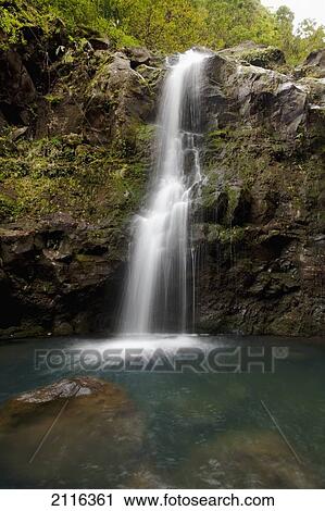 Hawaii, Maui, Hana, The three Waikani Falls with a clear blue pond on The Road To Hana View Large Photo Image Stock Image - Hawaii, Maui, Hana, The three Waikani Falls with a clear blue pond on The Road To Hana. Fotosearch