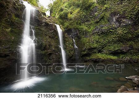 Hawaii, Maui, Hana, The three Waikani Falls with a clear blue pond on The Road To Hana View Large Photo Image Stock Photograph - Hawaii, Maui, Hana, The three Waikani Falls with a clear blue pond on The Road To Hana. Fotosearch