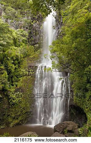 Stock Photography - Hawaii, Maui, Hana, Wailua Falls and lush foliage.. Fotosearch