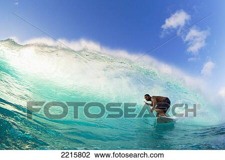 Hawaii, Maui, Honolua Bay, Surfer on Ocean Wave at Sunset. View Large Photo Image Stock Image - Hawaii, Maui, Honolua Bay, Surfer on Ocean Wave at Sunset.. Fotosearch
