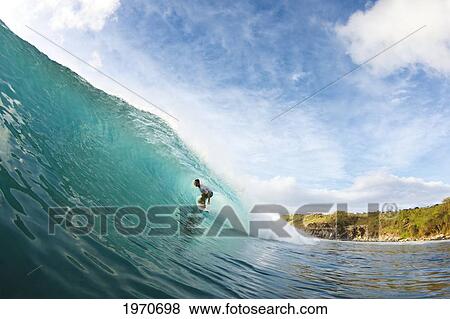 Hawaii, Maui, Honolua Bay, Surfer On Epic Wave At Sunset. For Editorial Use Only. View Large Photo Image Stock Photo - Hawaii, Maui, Honolua Bay, Surfer On Epic Wave At Sunset. For Editorial Use Only.. Fotosearch