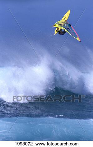 Hawaii, Maui, Ho'okipa, Alex Aguera In Air Above Large Crashing Wave A10D View Large Photo Image Stock Image - Hawaii, Maui, Ho'okipa, Alex Aguera In Air Above Large Crashing Wave A10D. Fotosearch
