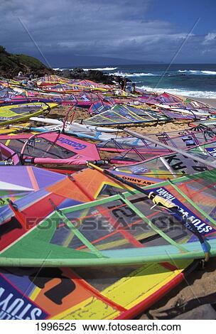 Stock Photography - Hawaii, Maui, Ho'okipa, Colorful Sails And Boards Covering Shore. Fotosearch