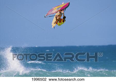 Stock Image - Hawaii, Maui, Ho'okipa, Ian Boyd Off The Lip, Airborne. Fotosearch