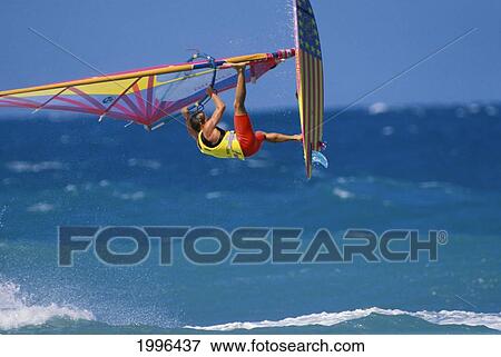 Hawaii, Maui, Ho'okipa, Ian Boyd, One-Footed Jump, Board Vertical To Ocean View Large Photo Image Stock Photo - Hawaii, Maui, Ho'okipa, Ian Boyd, One-Footed Jump, Board Vertical To Ocean. Fotosearch
