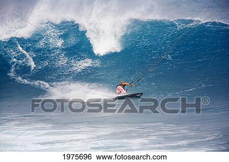 Hawaii, Maui, Ho'okipa, Pete Cabrinha Kitesurfing On Large Blue Wave. View Large Photo Image Stock Photograph - Hawaii, Maui, Ho'okipa, Pete Cabrinha Kitesurfing On Large Blue Wave.. Fotosearch