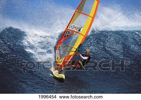 Picture - Hawaii, Maui, Jason Prior Glides Through Shimmering Translucent Wave. Fotosearch