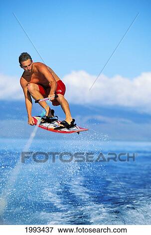 Hawaii, Maui, Kaanapali, Man Wakeboarding Catches Air View Large Photo Image Stock Photo - Hawaii, Maui, Kaanapali, Man Wakeboarding Catches Air. Fotosearch