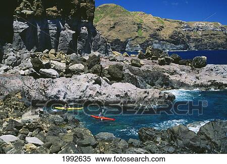 Stock Photography - Hawaii, Maui, Kahakuloa, Two Men Kayaking Along Coast, Rocky Shoreline, Ocean Fun.. Fotosearch